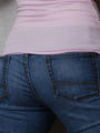 Shes pulling pants way down!